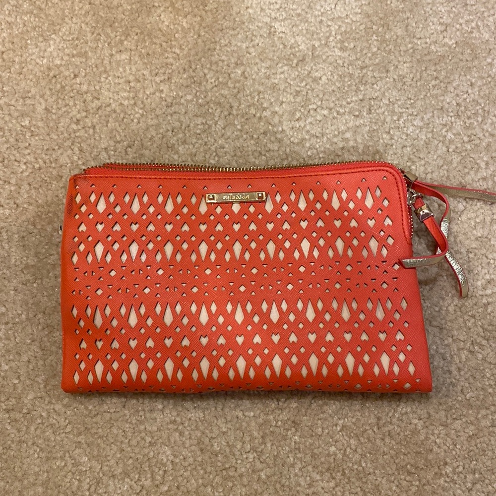 Coral Stella & Dot clutch